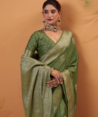 green tissue silk blend woven saree with unstitched blouse piece 4