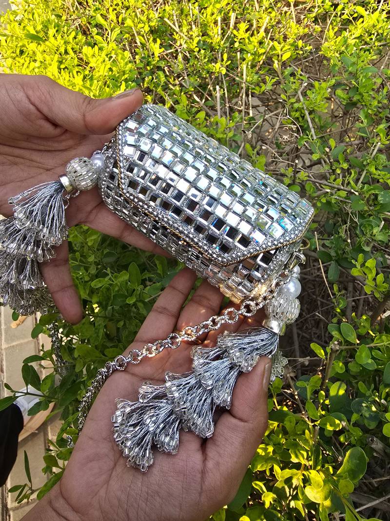 Jharoka heeramandi clutch bag