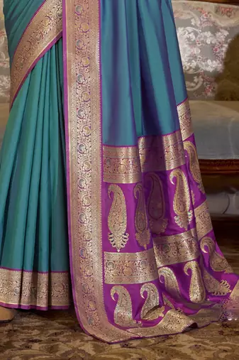 teal soft silk blend woven saree with unstitched blouse piece