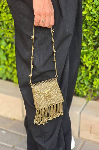 Noor tassel minaudière clutch bag gold