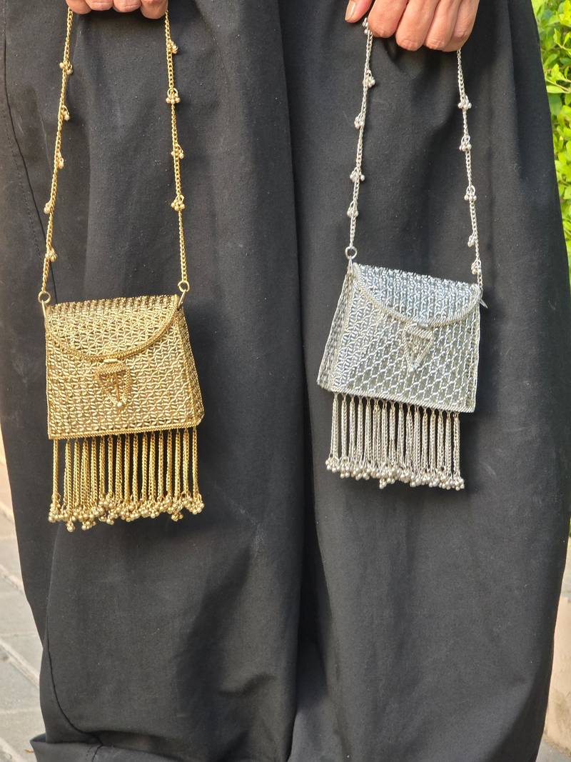 Noor tassel minaudière clutch bag silver