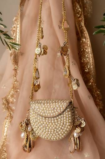 Mehfil-e-noor tassel clutch bag