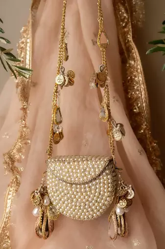 Mehfil-e-noor tassel clutch bag