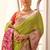 parrot green soft silk blend woven saree with unstitched blouse piece