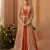 Orange chinon free size stitched anarkali suit with embroidery & sequence work