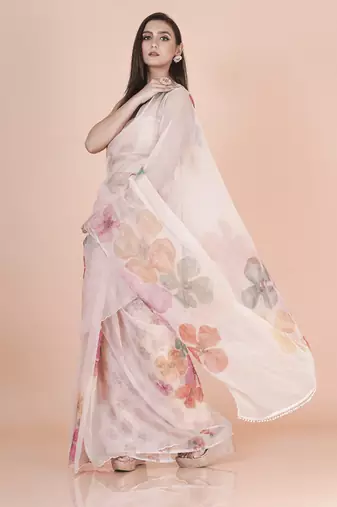 White coloured  floral styled digital printed with hand pita work & scalop border n. orgenza saree with blouse