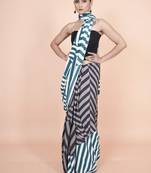 Multi coloured  geomatric styled digital printed crepe saree with blouse