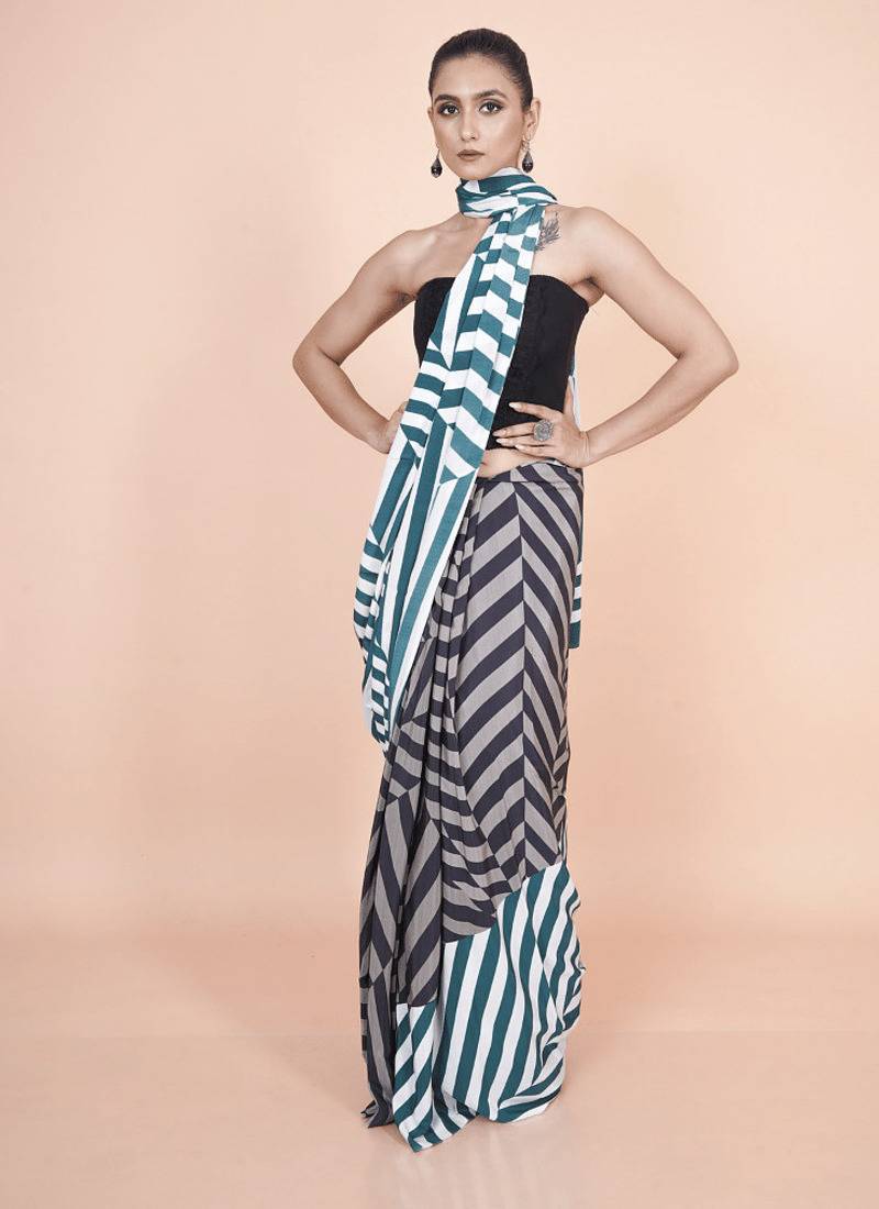 Multi coloured  geomatric styled digital printed crepe saree with blouse