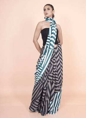 Multi coloured  geomatric styled digital printed crepe saree with blouse 3