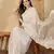 Women's white organza embroidered saree with unstitched blouse piece