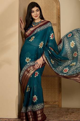 Women's teal chiffon printed saree with unstitched blouse piece