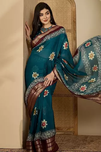 Women's teal chiffon printed saree with unstitched blouse piece