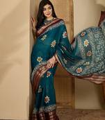 Women's teal chiffon printed saree with unstitched blouse piece