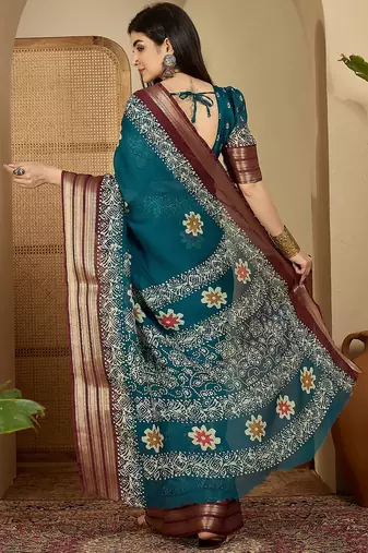 Women's teal chiffon printed saree with unstitched blouse piece