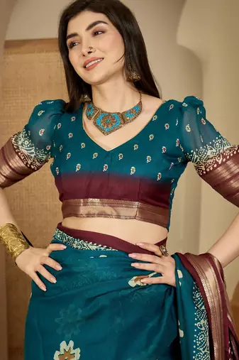 Women's teal chiffon printed saree with unstitched blouse piece