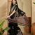 Women's black chiffon printed saree with unstitched blouse piece