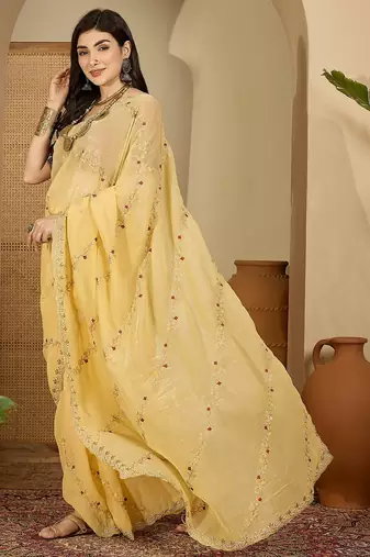 Women's yellow chiffon embroidered saree with unstitched blouse piece