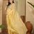 Women's yellow chiffon embroidered saree with unstitched blouse piece