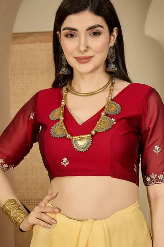 Women's yellow chiffon embroidered saree with unstitched blouse piece