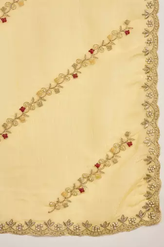 Women's yellow chiffon embroidered saree with unstitched blouse piece