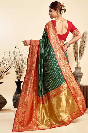 green silk blend banarasi saree with blouse 