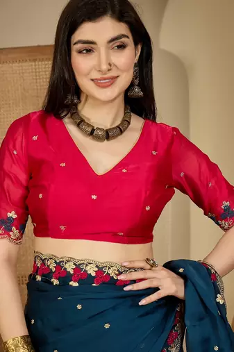 Women's teal chiffon embroidered saree with unstitched blouse piece