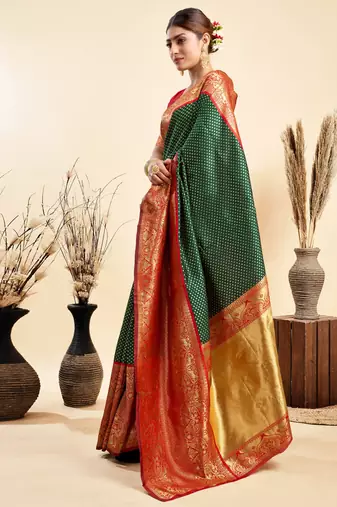 green silk blend banarasi saree with blouse 