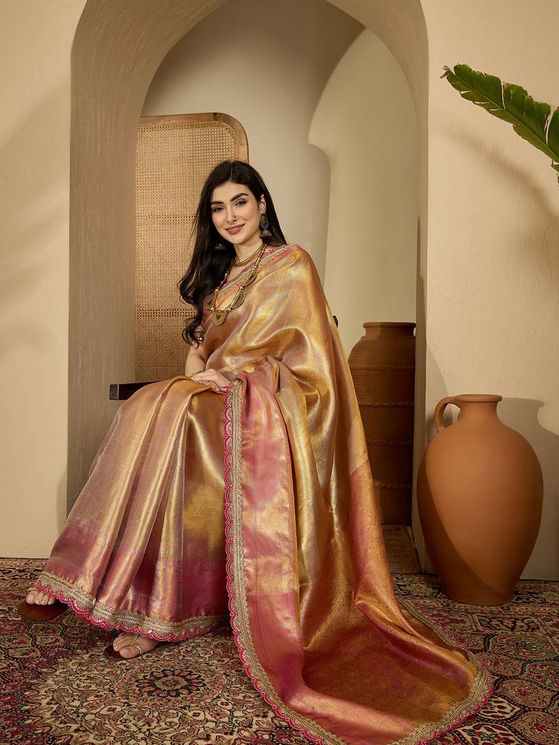 women's gold silk blend blend zari saree with unstitched blouse piece