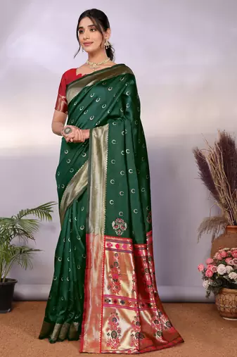 green silk blend banarasi saree with blouse 