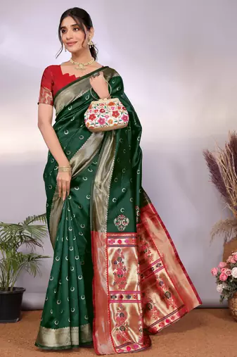 green silk blend banarasi saree with blouse 