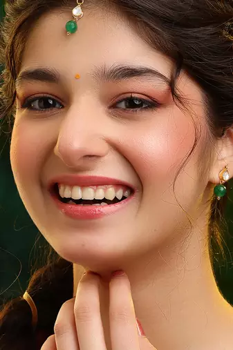 Gold plated kundan green stones maang tikka