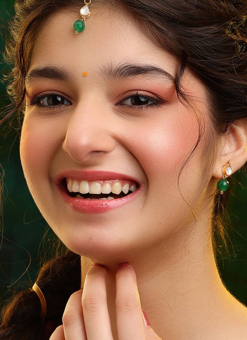 Gold plated kundan green stones maang tikka