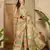 Women's pista organza zari woven saree with unstitched blouse piece