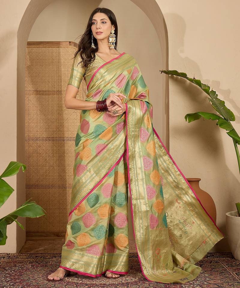 Women's pista organza zari woven saree with unstitched blouse piece