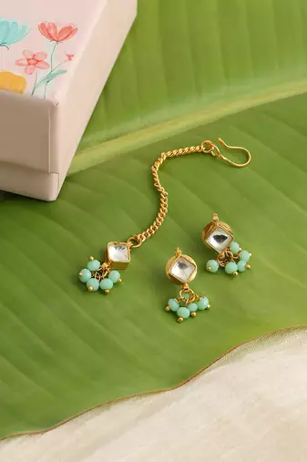 Gold plated kundan green stones maang tikka