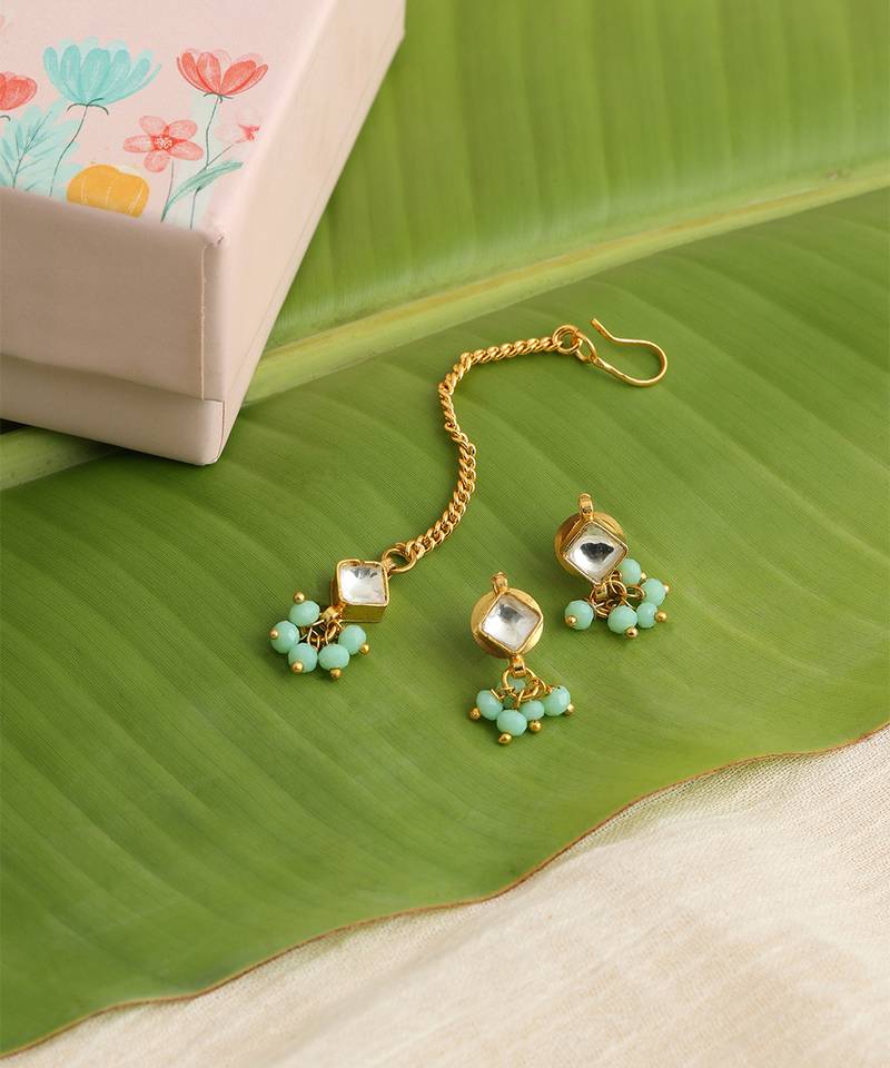 Gold plated kundan green stones maang tikka