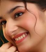 Gold plated kundan green stones maang tikka