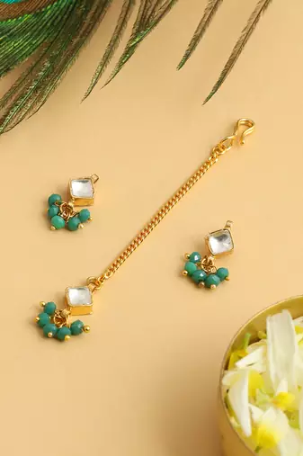 Gold plated kundan green stones maang tikka