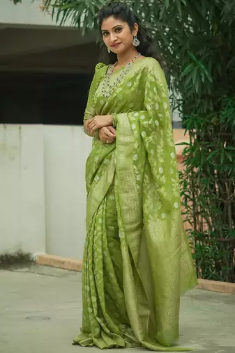 green silk blend banarasi saree with blouse 