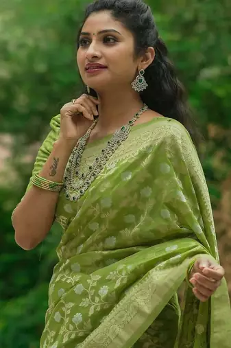 green silk blend banarasi saree with blouse 