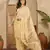 Women's yellow chiffon foil print saree with unstitched blouse piece