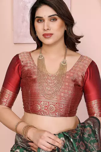 green silk blend banarasi saree with blouse 