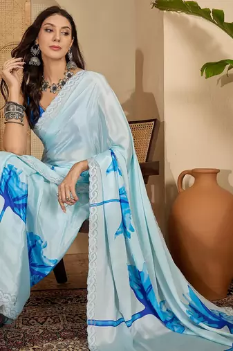 Women's sky blue crepe printed saree with unstitched blouse piece