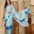 Women's sky blue crepe printed saree with unstitched blouse piece