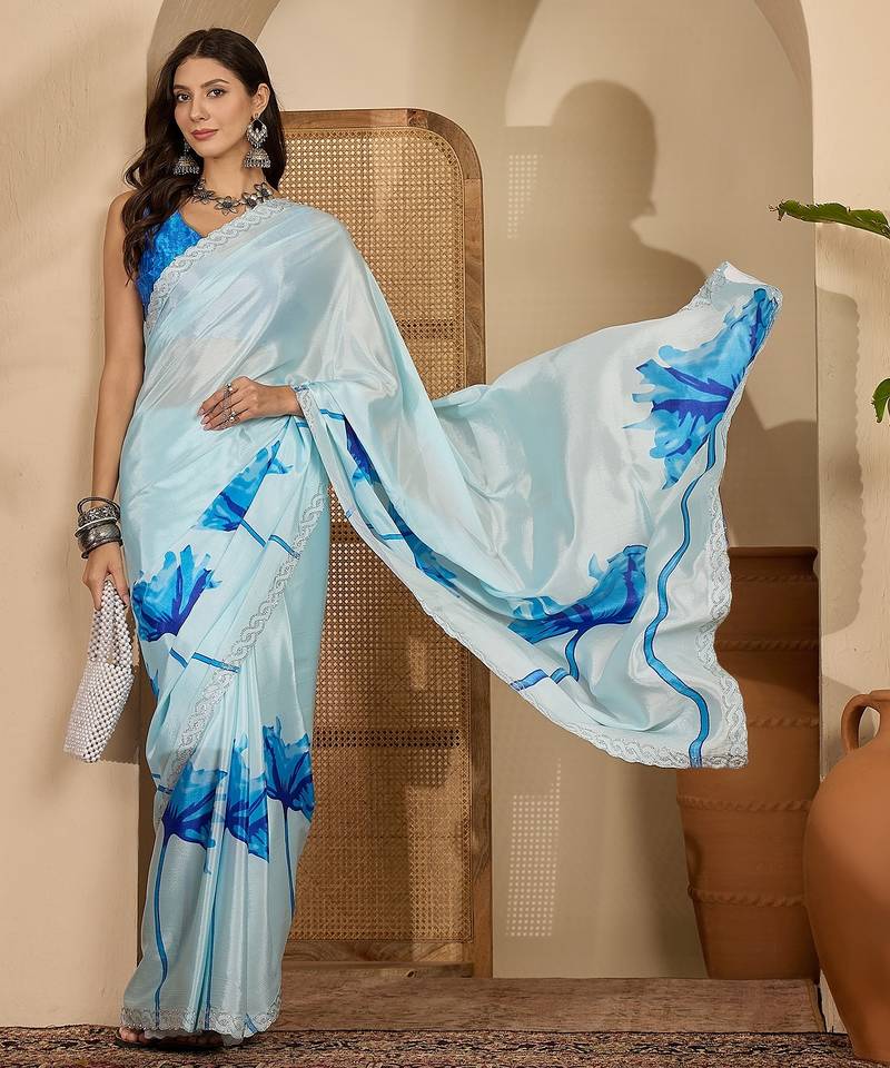 Women's sky blue crepe printed saree with unstitched blouse piece