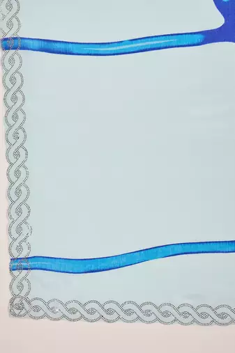 Women's sky blue crepe printed saree with unstitched blouse piece