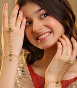 Gold plated kundan green stones haath phool