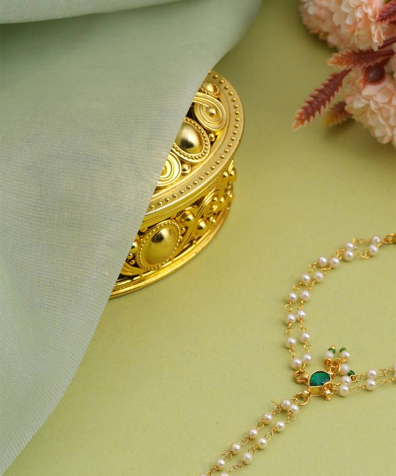 Gold plated kundan green stones haath phool
