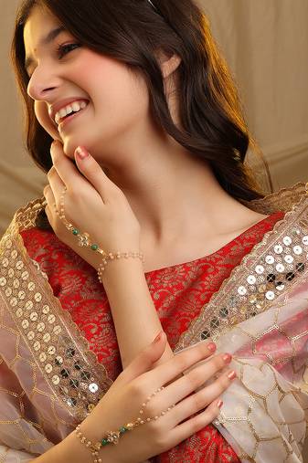 Gold plated kundan green stones haath phool