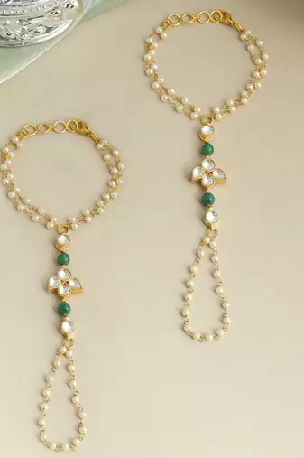 Gold plated kundan green stones haath phool
